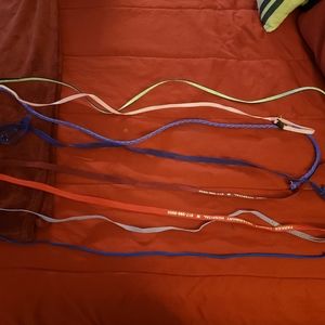 8 small dog leashes, ranging from 4 to 5 feet. All are like new